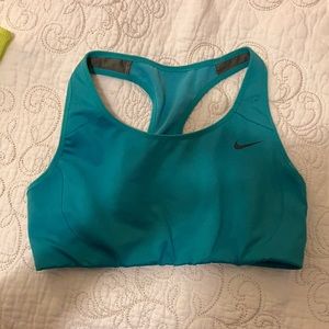 Teal colored Nike Sports bra